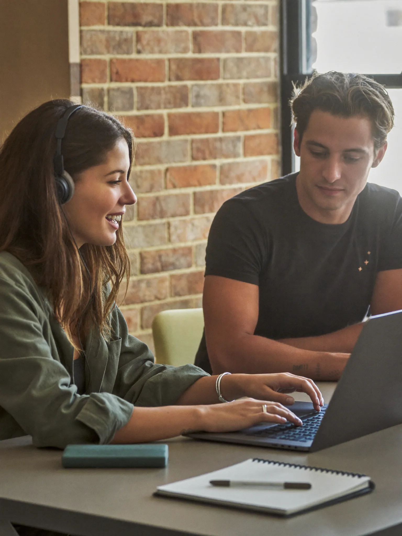 Agency owners reviewing a screen together